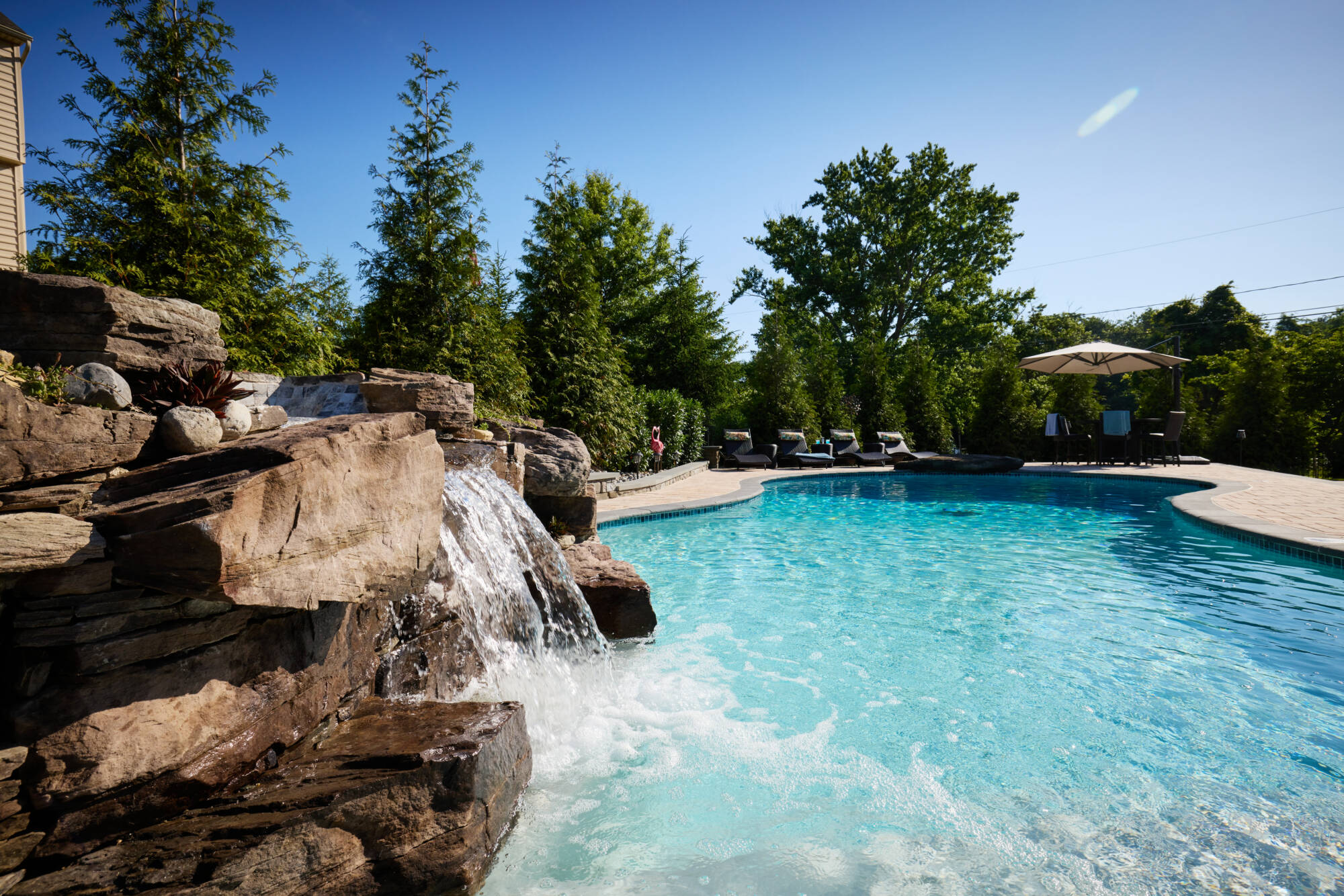 Lazo Landscaping Inground Pool Installation, Outdoor Kitchen Design, Fire Pit Installation, Pergola with Swing